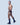 Smiling male model posing sideways while wearing black mesh jockstrap from the Sexy Jockstraps collection.