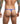 Person wearing a blue thong with tattoos on arms against a white background